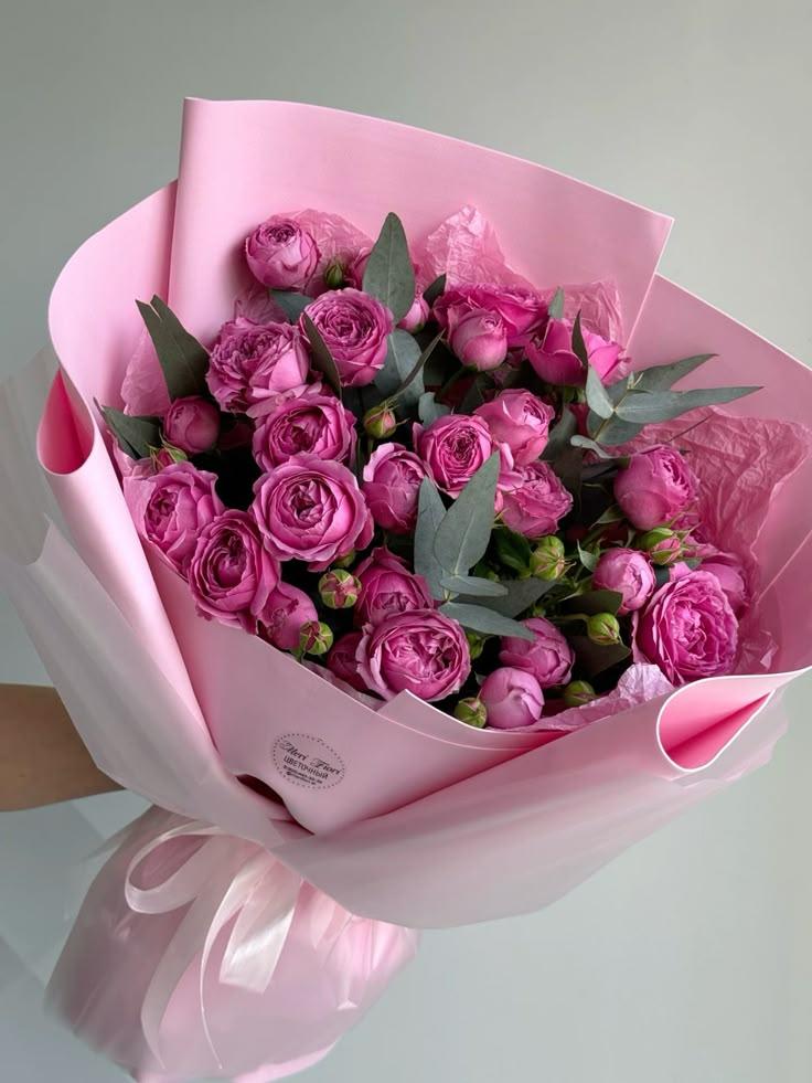 Professional floral arrangement in modern corporate setting